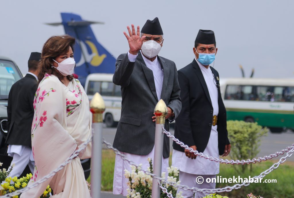 Prime Minister Sher Bahadur Deuba waves as he leaves for India, at the Kathmandu airport, on Friday, April 1, 2022. Photo: Aryan Dhimal
