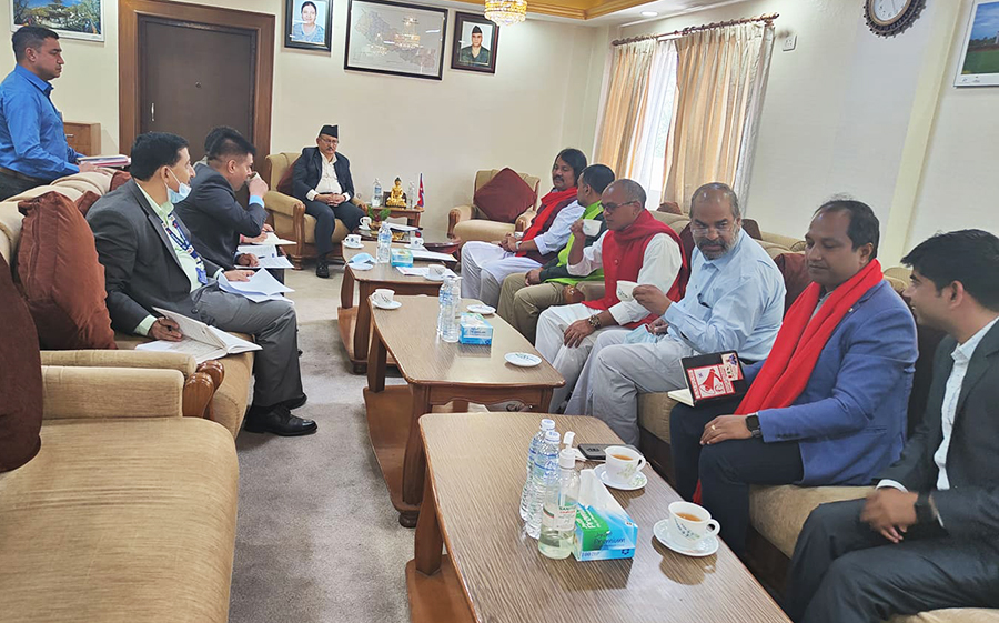 Home Minister Bal Krishna Khand meets representatives of CK Raut-led Janamat Party, in Kathmandu, on Friday, April 15, 2022.