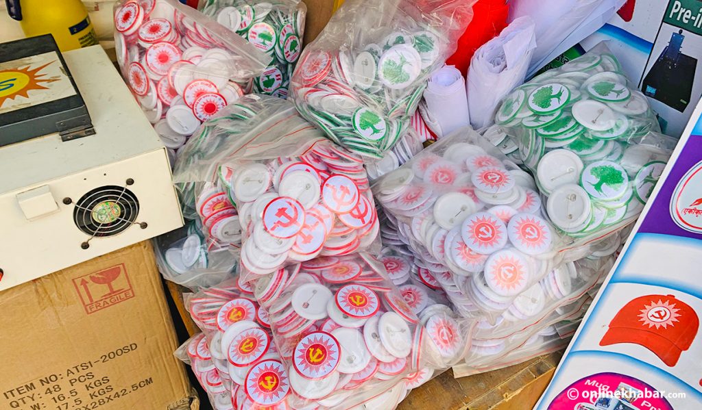 Badges showing election symbols of various parties are ready to be supplied from a shop in Bagbazar of Kathmandu, ahead of local elections, in April 2022.