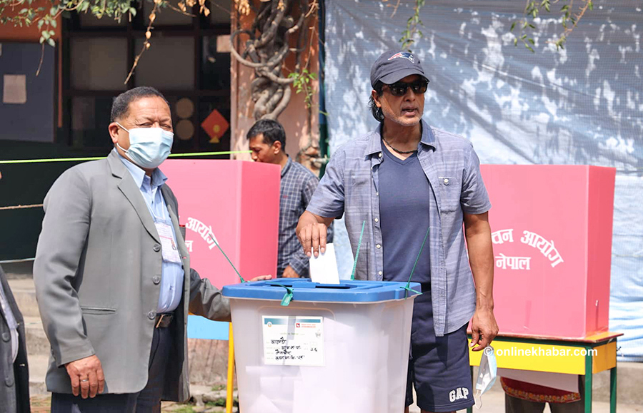 Nepali film industry superstar Rajesh Hamal casts his vote during the Nepal local elections in Kathmandu, on Friday, May 13, 2022. Photo: Kamal Prasai