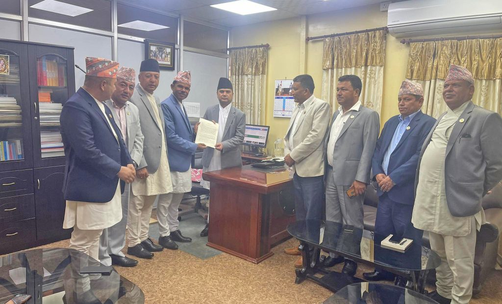 Lawmakers register an urgent public importance motion against recent fuel price, at the Federal Parliament Secretariat, in Kathmandu, on Tuesday, May 24, 2022.
