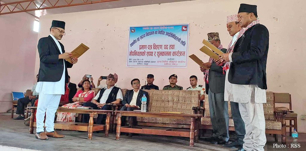 Newly elected local government chiefs take the oath of office and secrecy, in Lamjung, in May 2022. Photo: RSS