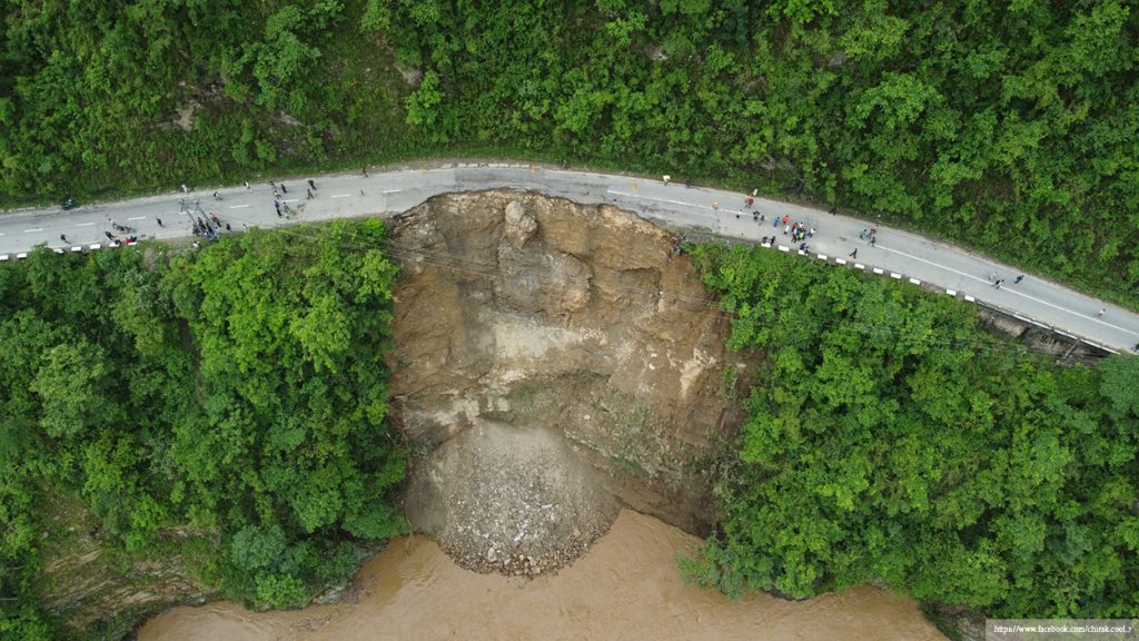 A landslide results in a section of the Prithvi Highway caved in, in Tanahun, on Thursday, June 9, 2022.