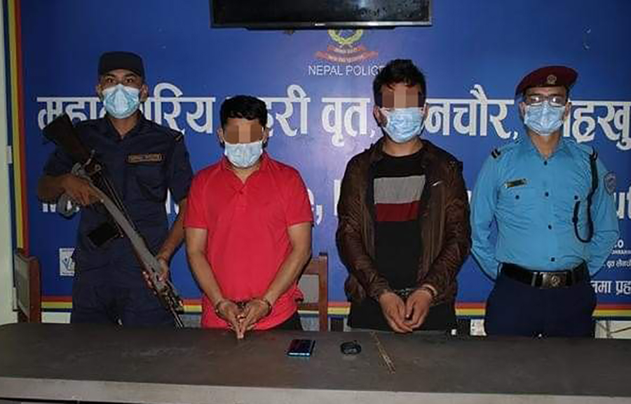 Two persons including a policeman arrested on the charge of robbery, in Kathmandu, on Monday, June 6, 2022.