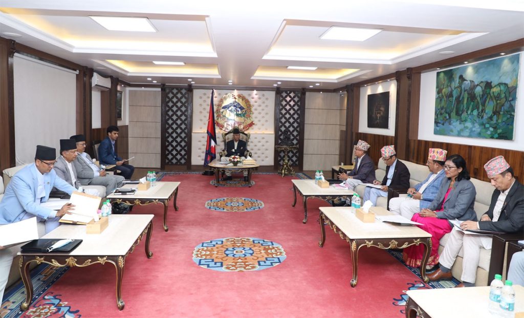 Election Commission officials meet Prime Minister Sher Bahadur Deuba in Kathmandu, on Wednesday, July 6, 2022.