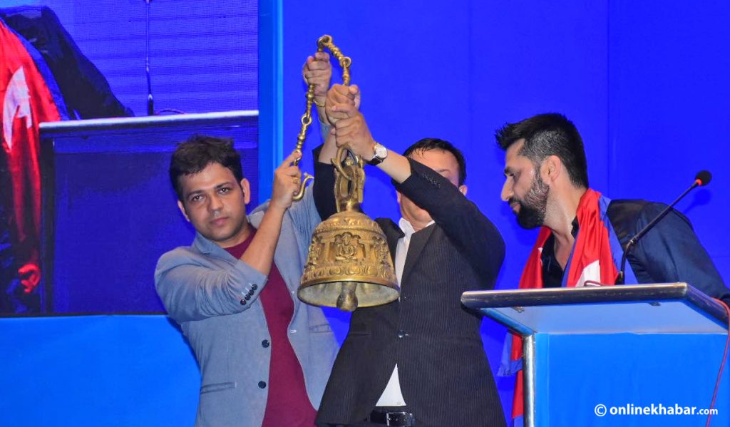 File: Rabi Lamichhane makes public the bell, the election symbol of Rastriya Swatantra Party (RSP)