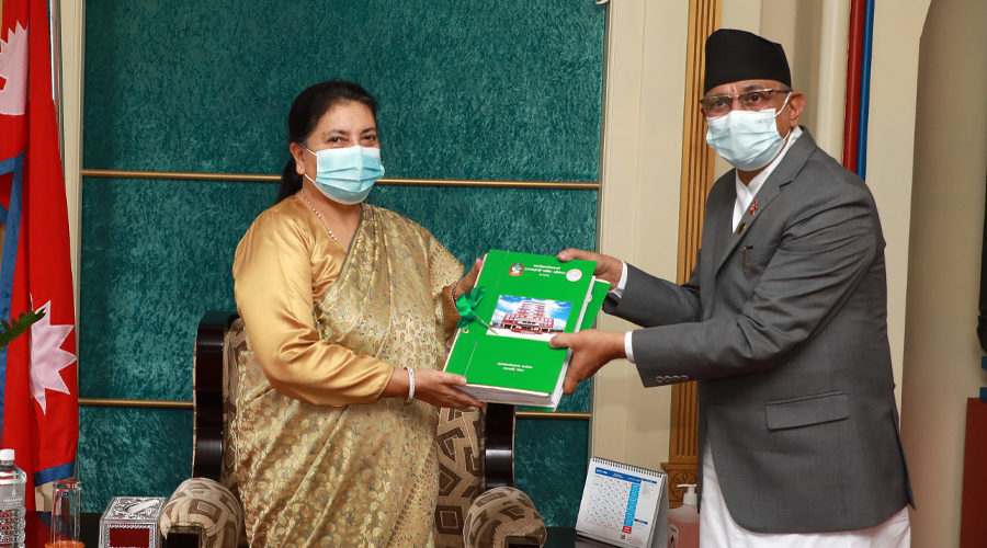 Auditor-General Tanka Mani Sharma submits the annual audit report of the government to President Bidya Devi Bhandari on Wednesday, July 13, 2022.