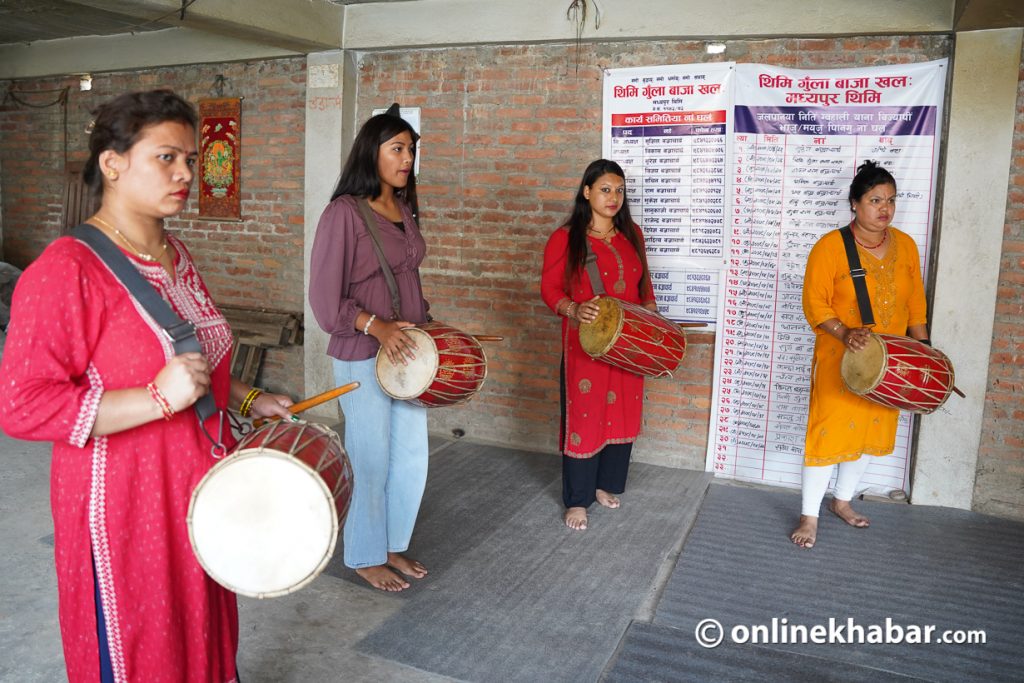 Female members of the Thimi Gunlaa Baaja Khala practise for Gunlaa at Digu Bahal, Madhyapur Thimi. Photo: Bikash Shrestha