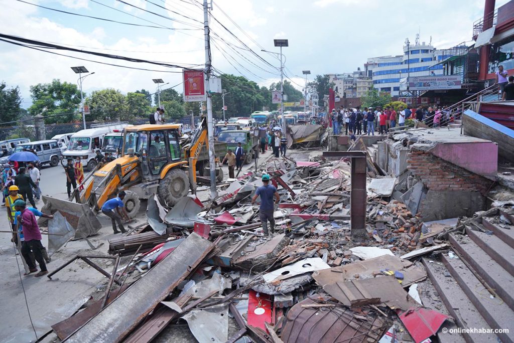 A heavy-duty machine demolishes a part of Kathmandu Mall, on Wednesday, August 24, 2022. Photo: Chandra Bahadur Ale 