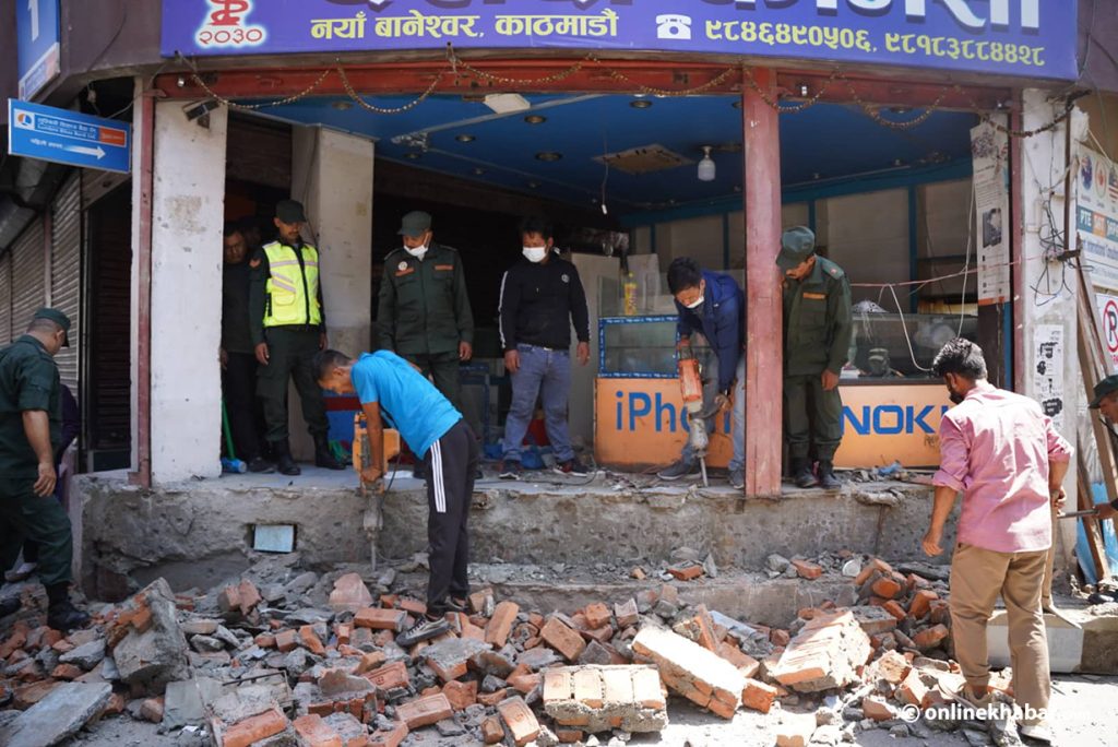 Kathmandu metropolitan city demolishes basement structures meant for underground parking as they have been found used for other purposes, in Kathmandu, on Monday, August 22, 2022. 