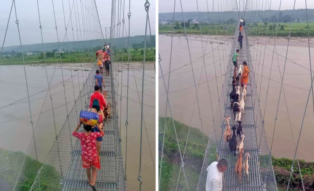 Locals leave their houses in search of a safer place as the Saptakoshi floodwater enters the Belaka town in Udayapur, on Wednesday, August 3, 2022. Photo: Social media