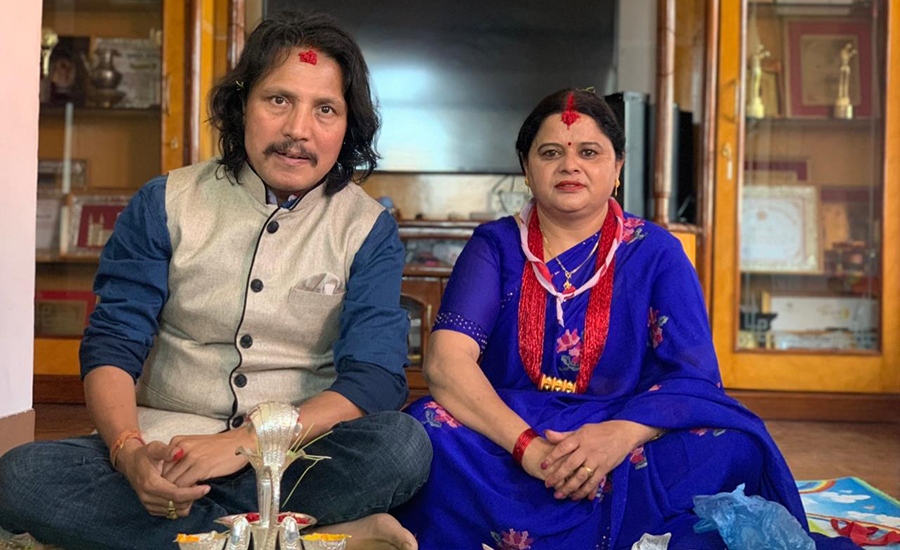Deepak Raj Giri with his wife on Dashain Tika day