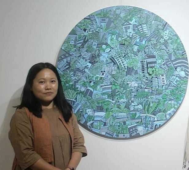 Artist Kunti Shree Thapa in her exhibition Parallel Existence at Thamel.