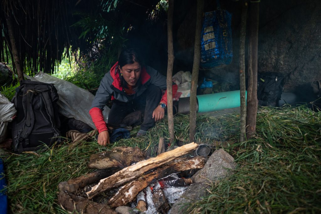 The founder of LaMa Walks makes fire as a part of training for trekking enthusiasts. Photo: LaMa Walks