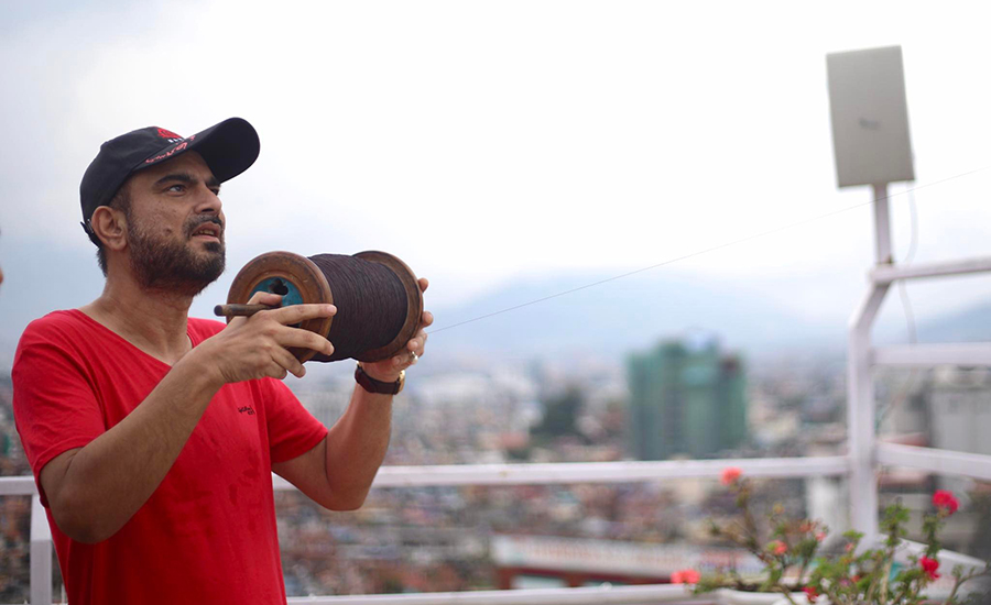 Singer Nabin K Bhattarai flies a kite.