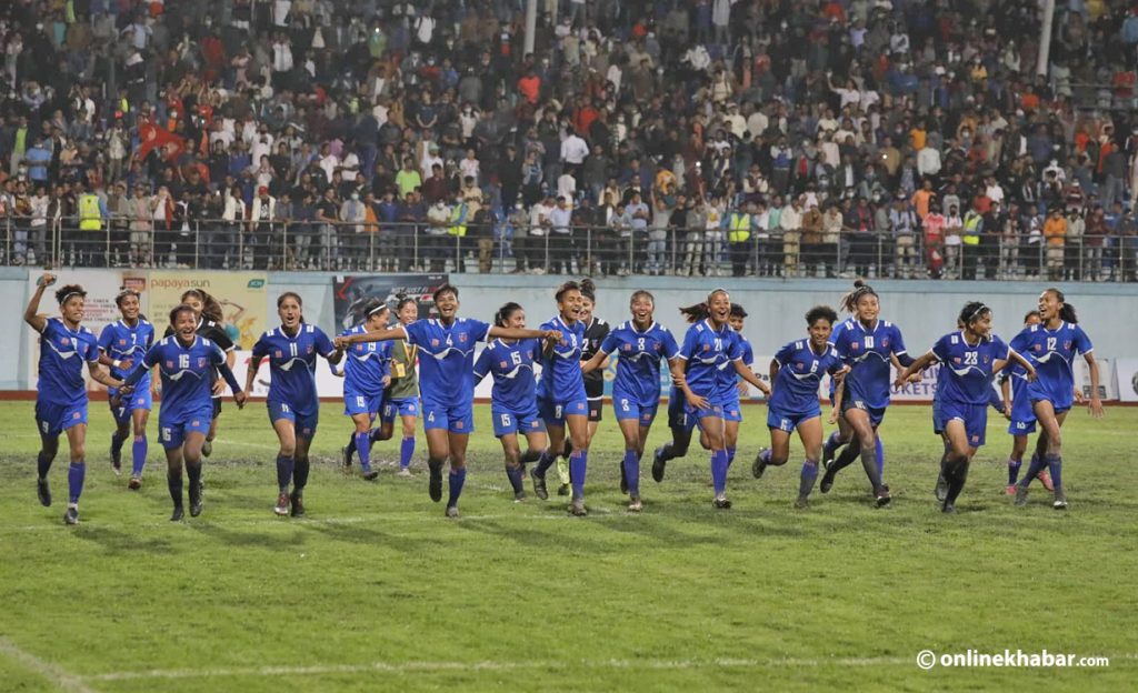Nepal footballers celebrate as they defeat India to enter the final of the SAFF Women's Championship, in Kathmandu, on Friday, September 16, 2022. Photo: Bikash Shrestha