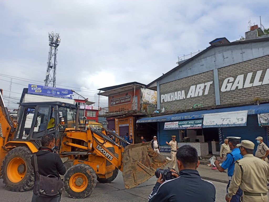 bulldoze illegal structures at the Pokhara Art Gallery pokhara metropolitan city