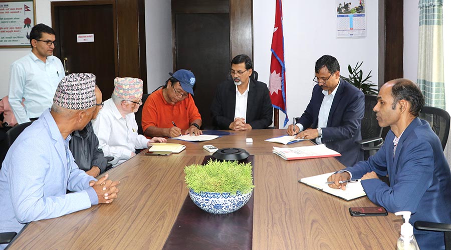 The government signs an agreement with Mahabir Pun-led National Innovation Centre to let it operate the Krishi Aujar Karkhana Limited, a Birgunj-based agricultural tool factory, in Kathmandu, on Tuesday, September 27, 2022. 