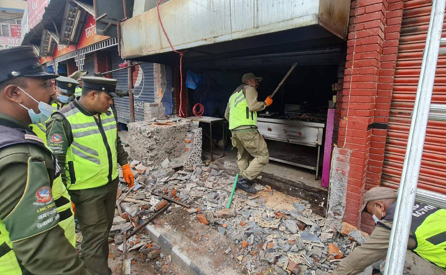 Lalitpur city police demolish illegal structures in the city in September 2022.