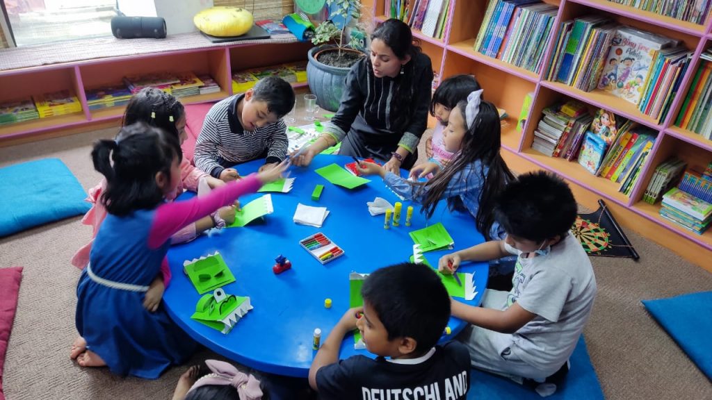 reading session with children in Coffee at Anu Books