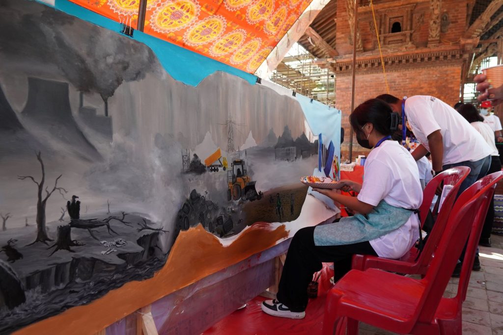 Children paint the climate canvas at an event organised by Save the Children, in Patan, on Saturday, October 15, 2022. Photo: Save the Children