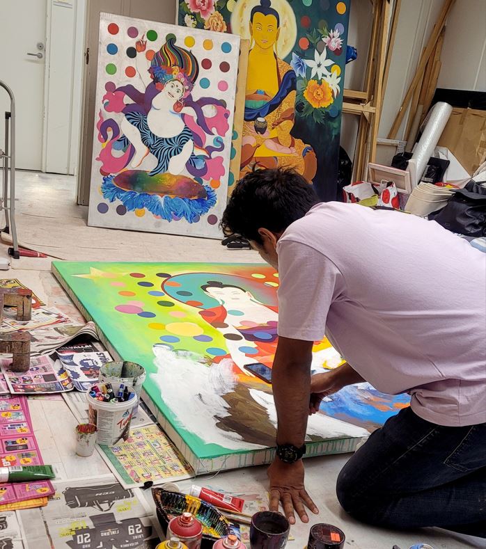 Jesus Shrestha works in his studio in Finland.