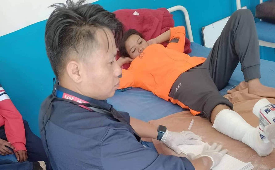 Athlete Pushpa Bhandari is injured while running during the 9th National Games, in Pokhara, on Tuesday, November 18, 2022.