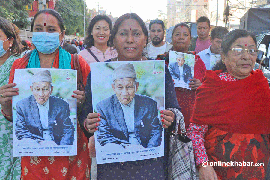 Lalitpur locals gather to pay tributes to Satya Mohan Josohi after his death on Sunday, October 16, 2022. 