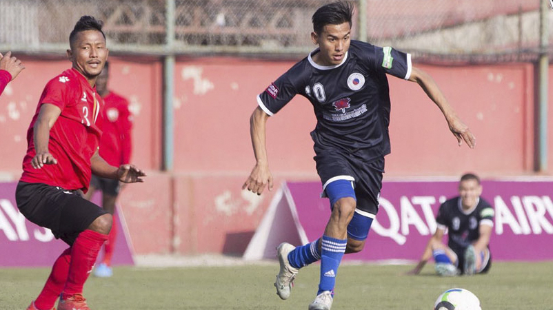 File: Footballer Prezen Tamang (in black jersey)