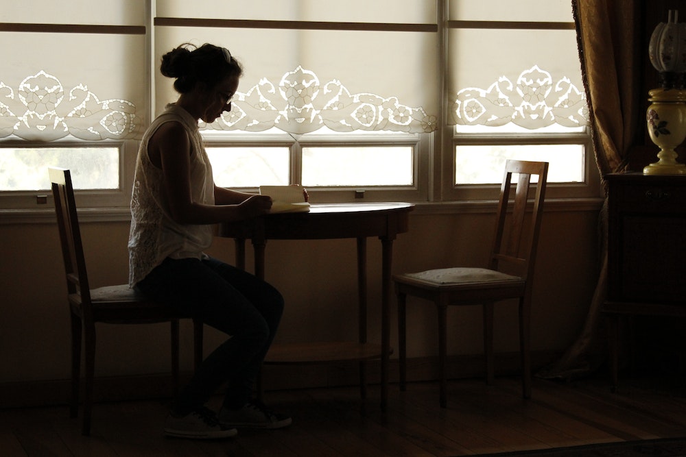 woman reading book