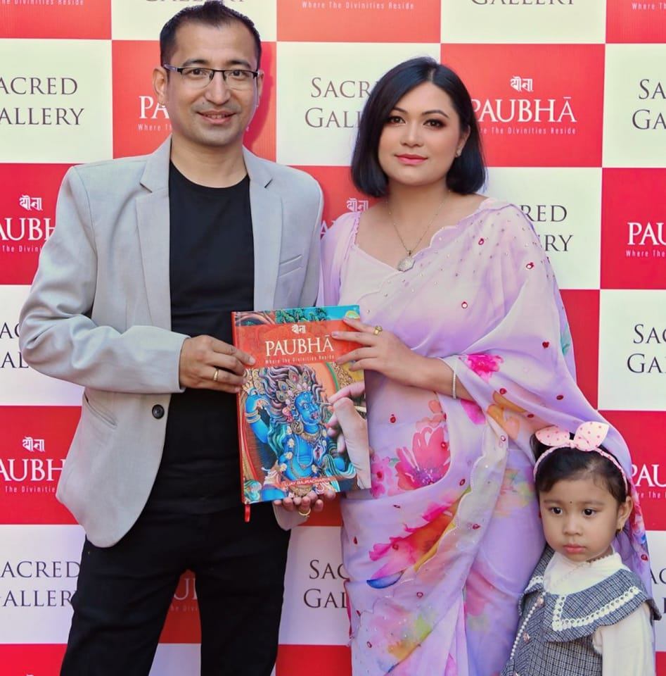 Artist Ujay Bajracharya with his family during the book release event.