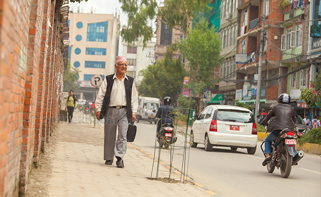 File Photo: Chitra Bahadur KC walking towards the parliament building