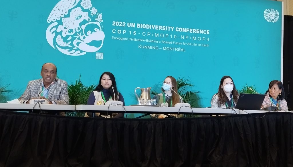 (Far-left) Nepal's biodiversity COP15 delegation leader Megh Nath Kafle speaks during a side event as indigenous leader Yasso Kanti Bhattachan looks (far-right), in Montreal, on December 9, 2022. Photo: Diwakar Pyakurel