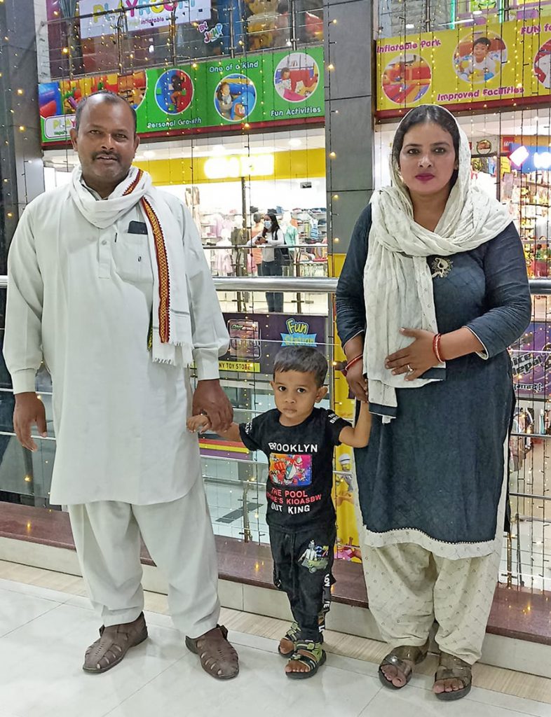 Jubeda Khatun with her husband and their child