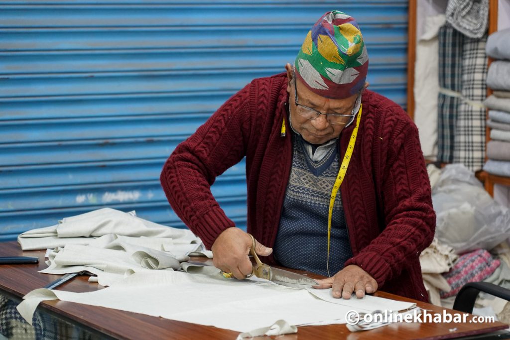 Hera Bahadur Shakya working at his shop