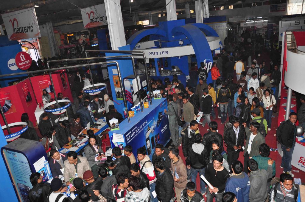 File: Visitors gather at CAN Infotech 