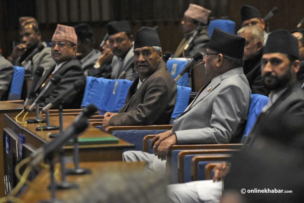 Nepali Congress president Sher Bahadur Deuba looks at Prime Minister Pushpa Kamal Dahal during a parliament meeting on Monday, January 9, 2022. Photo: Chandra Bahadur Ale