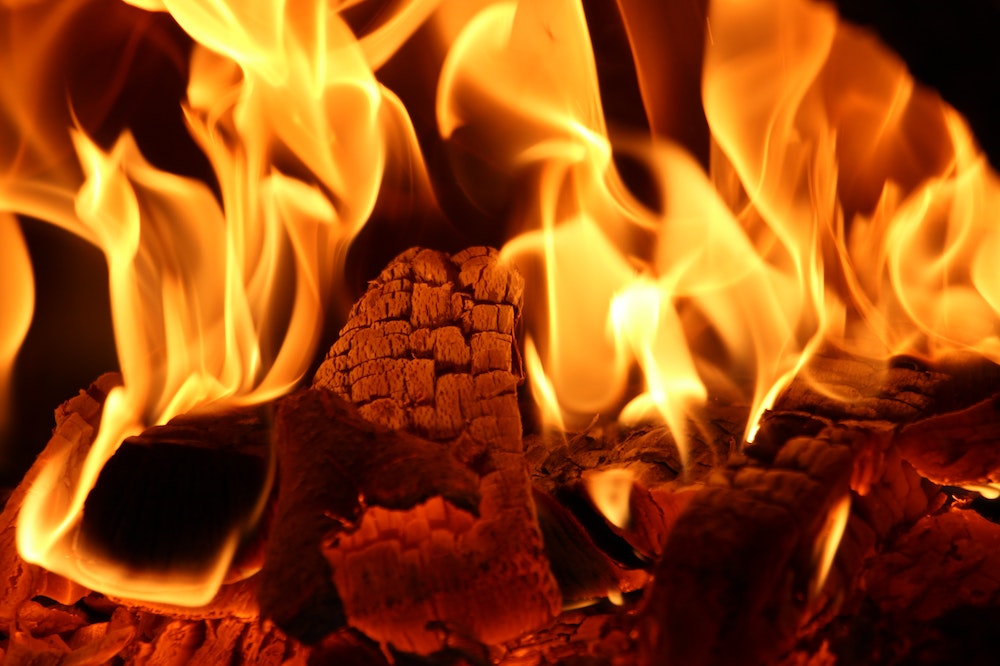 firewood in room leading to death by asphyxiation burn injuries