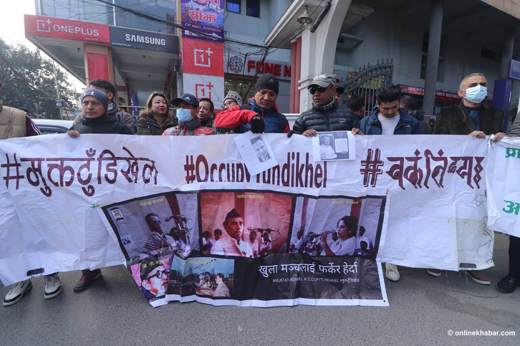 Occupy Tundikhel activists gherao the Kathmandu metropolitan city office against the Khulamanch underground parking facility plan, on Monday, January 2, 2023. Photo: Aryan Dhimal