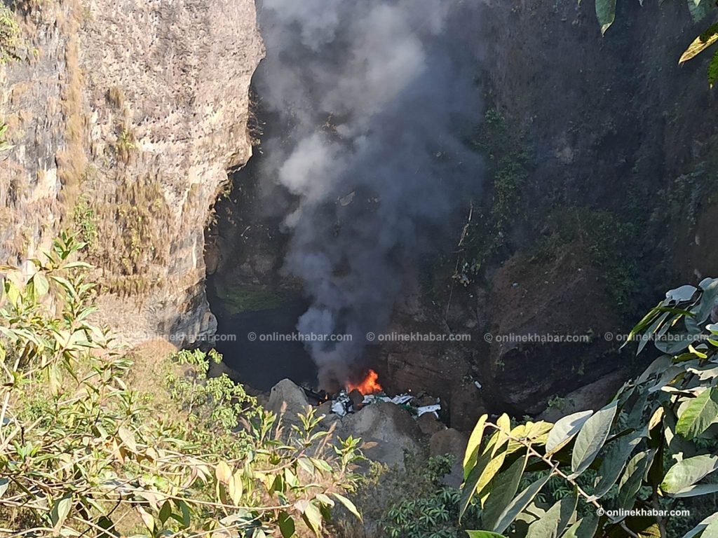 Fire breaks out in the gorge of the Seti river following the Pokhara plane crash, on Sunday, January 15, 2023. Photo: Sudarshan Ranjit