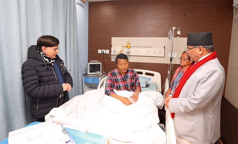 Prime Minister Pushpa Kamal Dahal meets CPN-Maoist Centre leader Barsha Man Pun, at the Sumeru Hospital, on Tuesday, January 17, 2023.