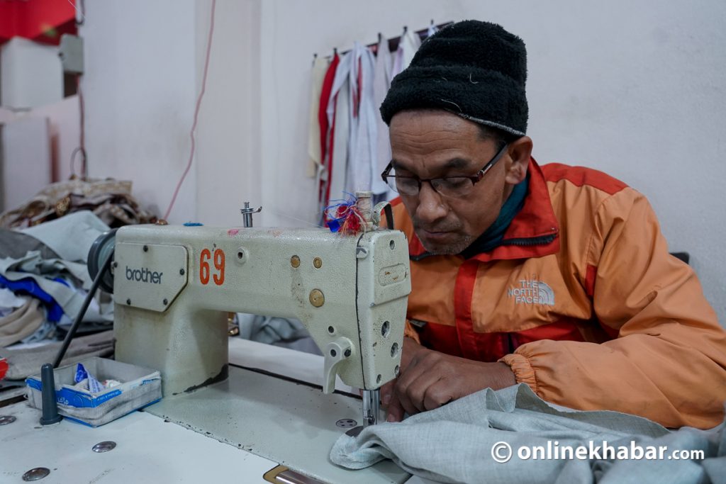 worker at rastriya daura suruwal tailors