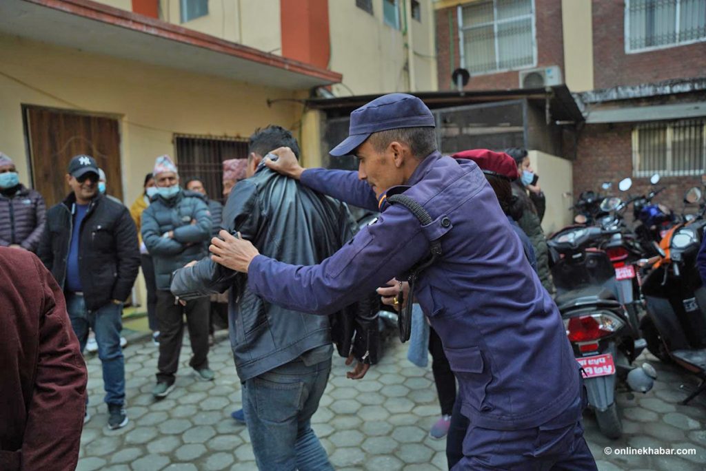 A medical student being controlled by Nepal Police. 