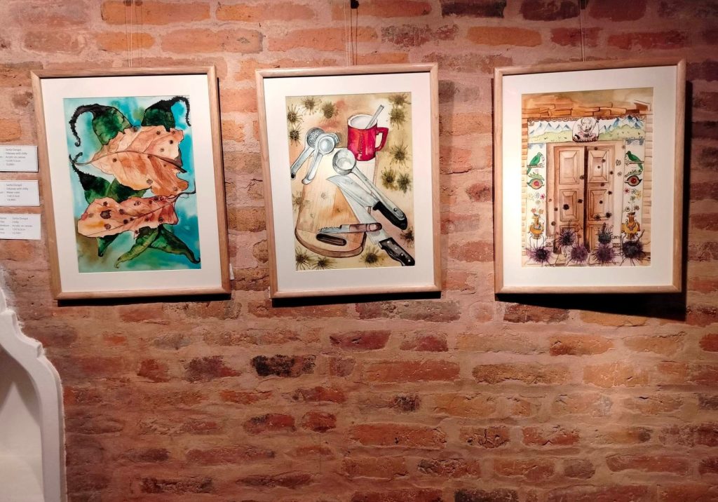 Paintings by visual artist Sarita Dongol in exhibition 'An Odyssey with Chilli’ at Newa Chen Gallery, Patan.