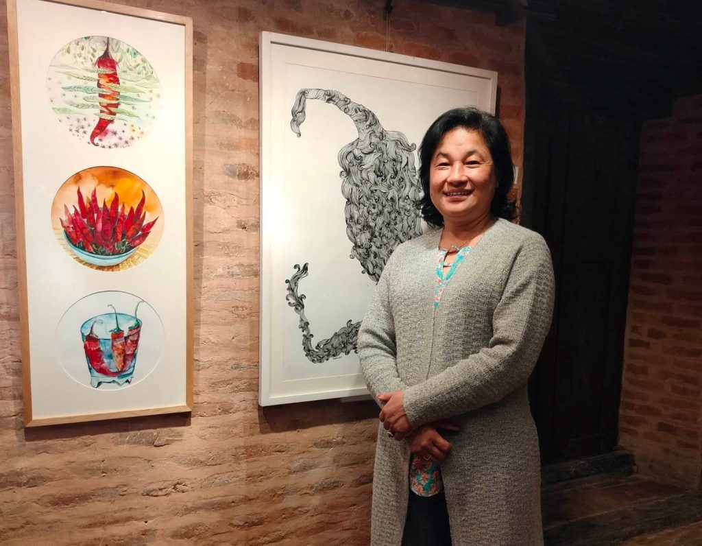 Visual artist Sarita Dongol at the painting exhibition An Odyssey with Chilli at Newa Chen Gallery, Patan, in February 2023. Photo: Sangita Shrestha