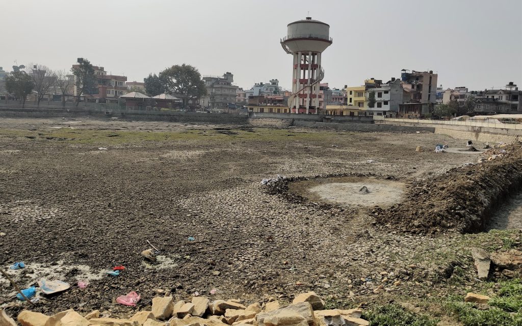 Bojepokhari of Imadol, Lalitpur, is currently dried up for construction. Photo: Nasana Bajracharya