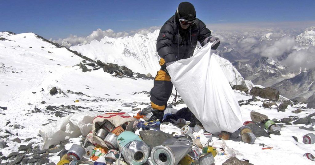 A Nepali army staff cleaning Everest. Clean mountain campaign