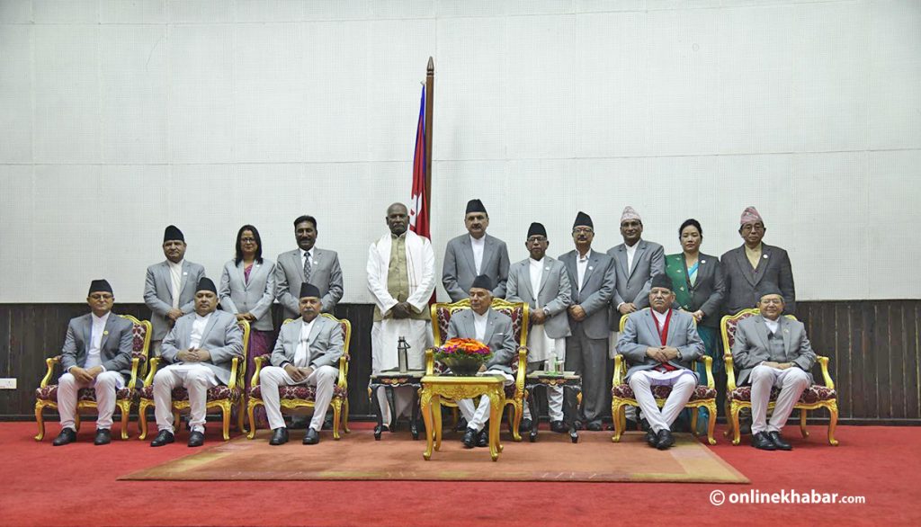 Newly appointed ministers in the latest round of cabinet expansion pose for a photograph following the oath ceremony, in Kathmandu, on Friday, March 31, 2023.  