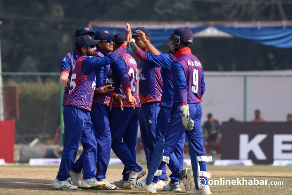 Nepal cricket team members celebrate a victory against Namibia during a match held under the ICC Men's Cricket World Cup League 2 in Kathmandu in February 2023.