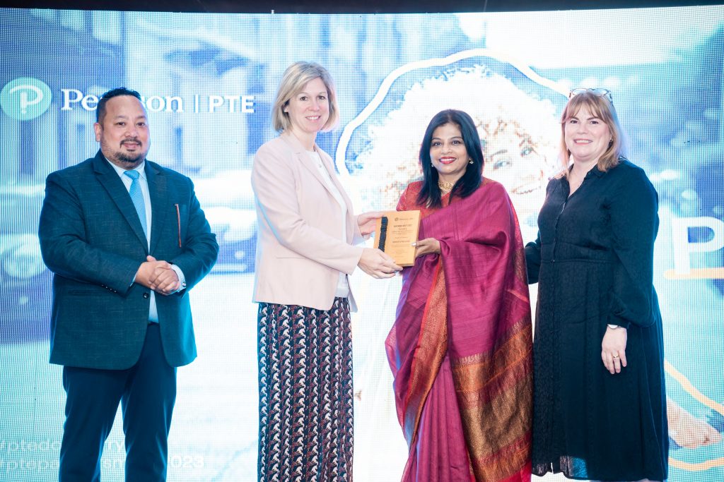 British Ambassador to Nepal Nicola Pollitt hands over an award during the PTE Partners Meet, in Kathmandu, in March 2023. 